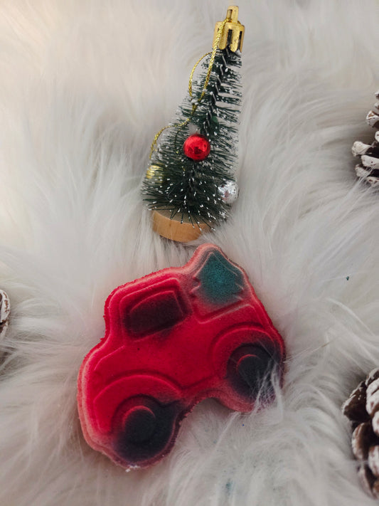 Bombe camion de Noël avec insertions de couleurs bonbon des fêtes